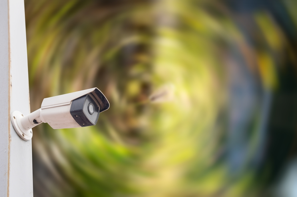 Exterior security camera covering a long rural driveway in Caledon